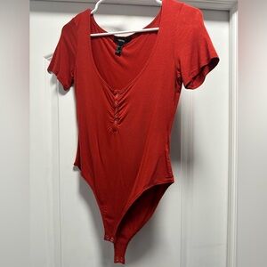 Reddish Orange Button Body suit